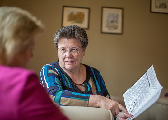 "Dr. Peggy Determeyer, Director of Community Bioethics And Aging Center (CBAC) and McGee Fellow In Bioethics And Aging, offering consulation for a client as it relates to end of life caregiving needs"